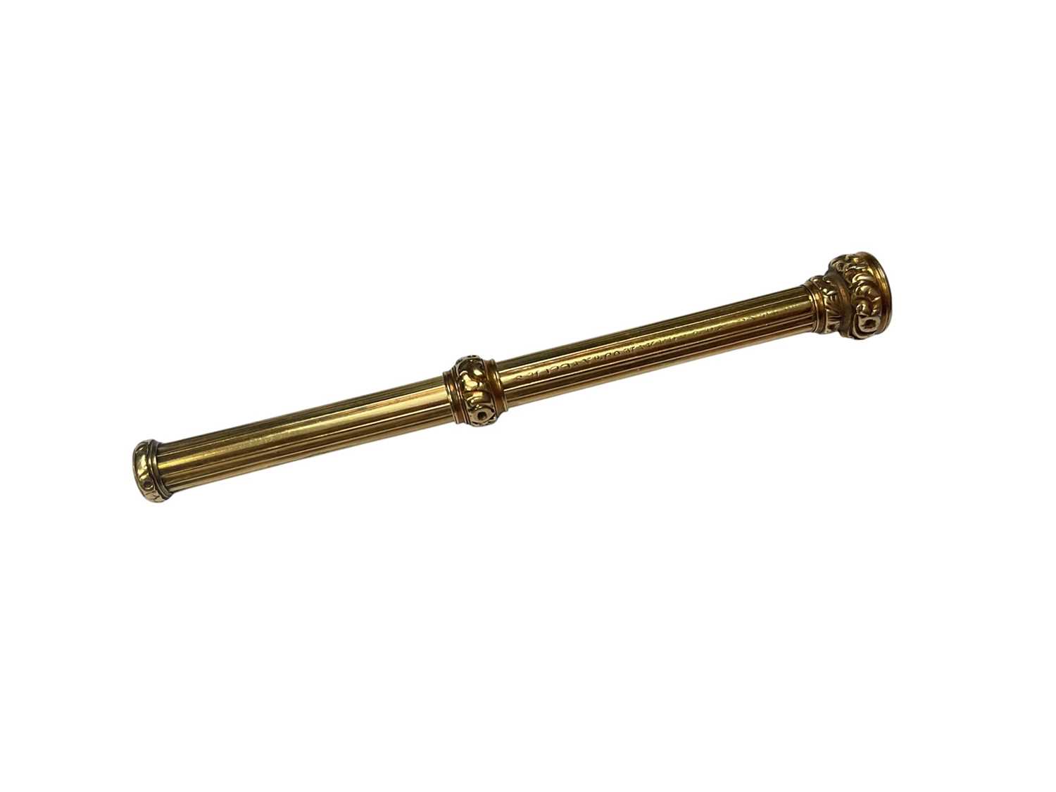 Lot 63 - Sampson Mordan & Co yellow metal propelling pencil with engraved crest seal top