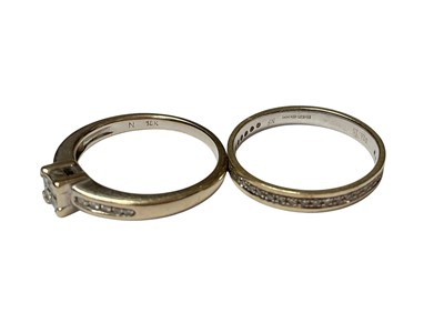 Lot 14 - Diamond cluster ring in 18ct white gold setting and 9ct white gold diamond half eternity ring (2)