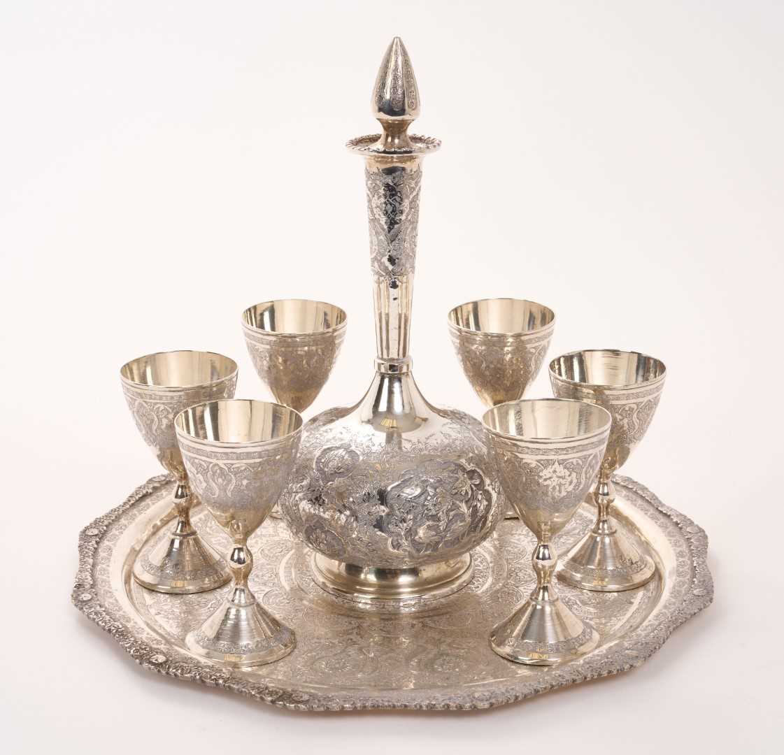 Lot 351 - Eastern white metal carafe and goblets set on matching tray