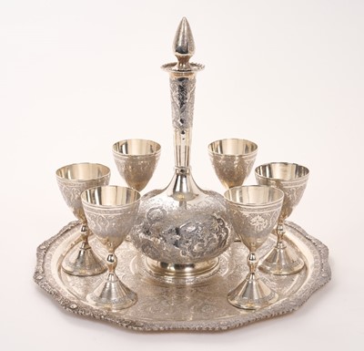 Lot Eastern white metal carafe and goblets set on matching tray