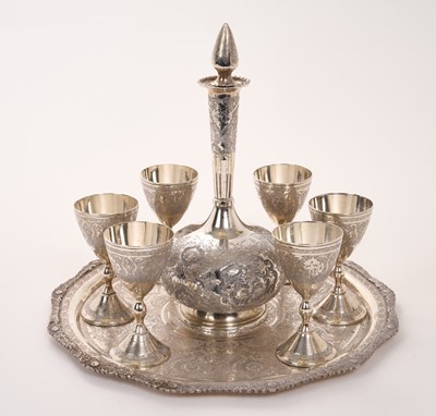 Lot 351 - Eastern white metal carafe and goblets set on matching tray