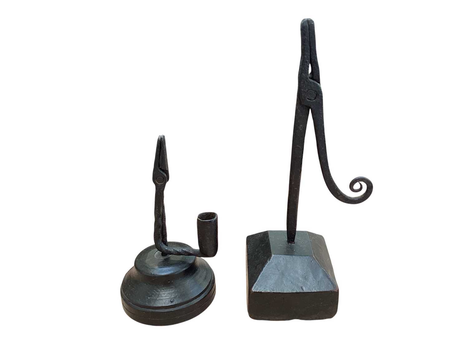 Lot 5037 - Two antique wrought iron rush light holders on wooden bases