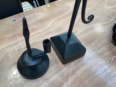Lot 5037 - Two antique wrought iron rush light holders on wooden bases