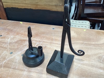 Lot 5037 - Two antique wrought iron rush light holders on wooden bases