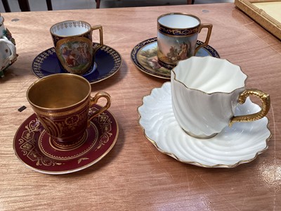 Lot 5047 - Group of four Vienna porcelain cups and saucers, together with two Dresden floral encrusted chocolate cups and covers, and a Coalport fluted cup and saucer