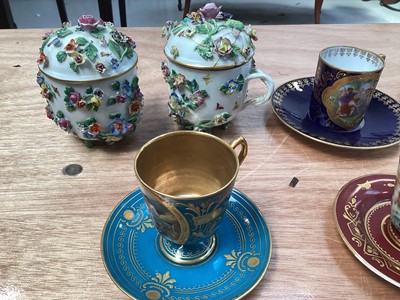 Lot 5047 - Group of four Vienna porcelain cups and saucers, together with two Dresden floral encrusted chocolate cups and covers, and a Coalport fluted cup and saucer