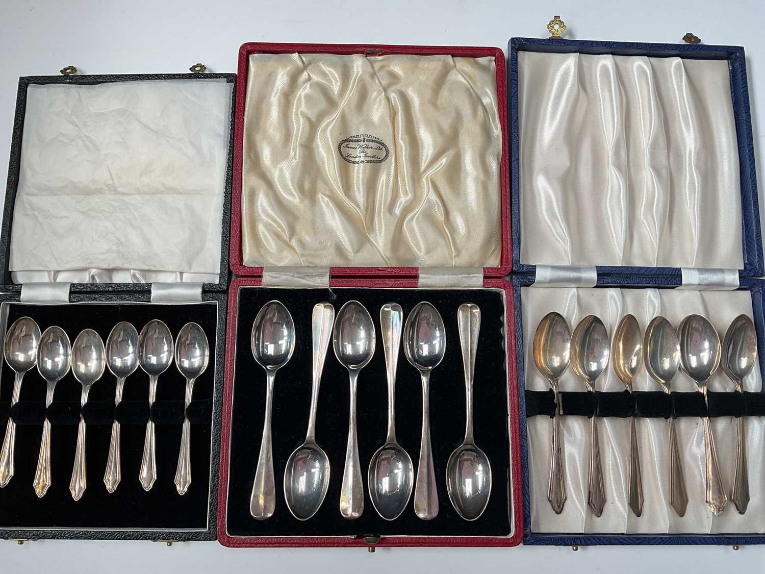 Lot 56 - Three cased sets of six silver teaspoons