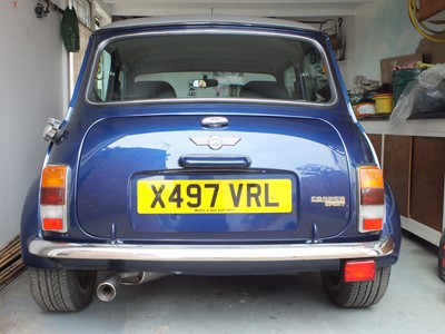 Lot 2000 Rover Mini Cooper Sport 1275cc, reg. no. X497 VRL, chassis no. XNPAZEYD186590, finished in Tahiti blue with silver roof and bonnet stripes. 22,460 miles, two previous owners, the current ow...