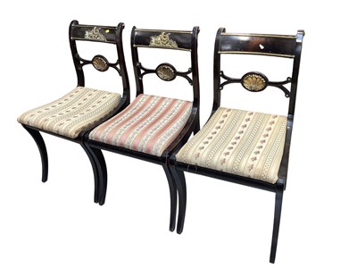 Lot 5369 - Set of three Regency style side chairs feature ebonized wood frames, 84cm tall
