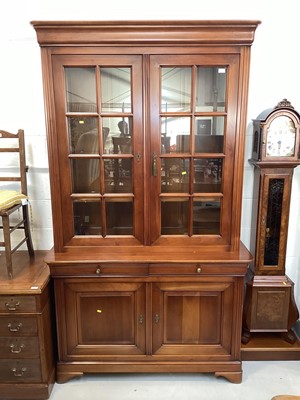 Lot 5357 - Contemporary two tier walnut display cabinet with glazed doors, 226cm tall x 130cm wide
