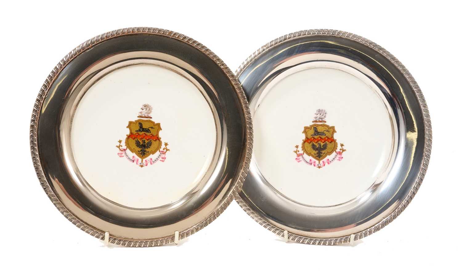Lot 290 - Pair of Minton porcelain armorial plates with silver plated mounts