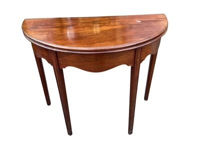 Lot 5351 - Georgian mahogany folding tea table, 91cm wide x 73cm tall
