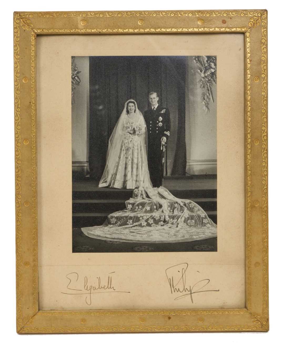 Lot 154 - T.R.H. The Princess Elizabeth (later H.M. Queen Elizabeth II) and The Duke of Edinburgh, signed 1947 wedding portrait photograph