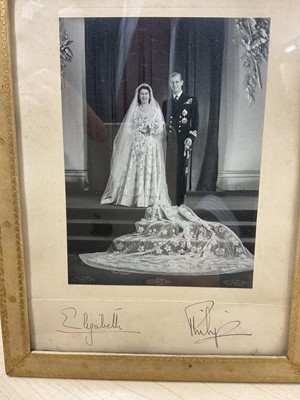 Lot 154 - T.R.H. The Princess Elizabeth (later H.M. Queen Elizabeth II) and The Duke of Edinburgh, signed 1947 wedding portrait photograph