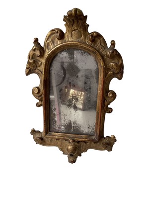 Lot 5335 - Small 19th century carved giltwood mirror with scrollwork ornament. 59cm x 36cm in total