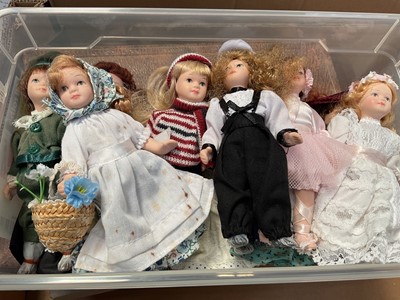 Lot 5146 - Group of miniature porcelain dolls in various outfits