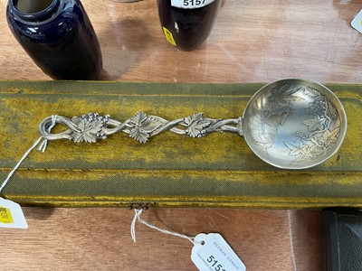 Lot 5160 - Good quality 19th century white metal berry spoon with gilded decoration depicting a wolf