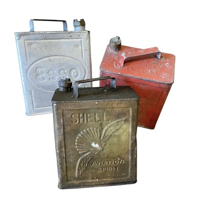 Lot 13 - Original Shell Aviation Spirit fuel can, together with an Esso fuel can, with later added tap to base, and an unbranded fuel can (3)