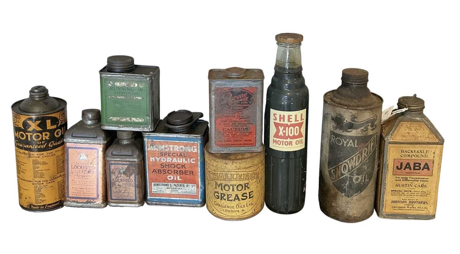 Lot 19 - Collection of ten assorted vintage oils and lubricants in bottles and tins to include Snowdrift oil, Shell and Lockheed (10)