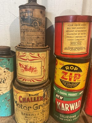 Lot 22 - Collection of thirteen assorted vintage oils and lubricants in bottles and tins to include Pratts Motor Oil, Castrol and Challenge Motor Grease (13)