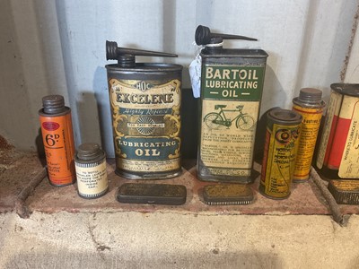 Lot 23 - Collection of fourteen assorted vintage cycle oils and lubricants in bottles and tins to include Dunlop and John Bull (14)
