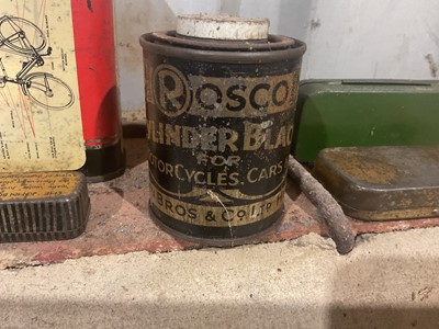 Lot 23 - Collection of fourteen assorted vintage cycle oils and lubricants in bottles and tins to include Dunlop and John Bull (14)