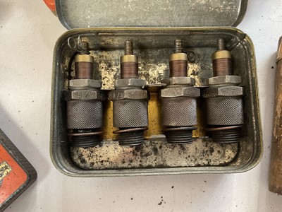 Lot 31 - Collection of vintage spark plugs to include Champion and KLG, in original packaging together with a group of fuel can caps