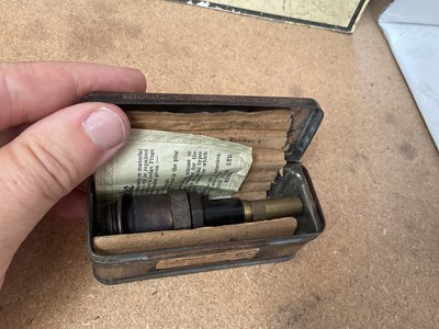 Lot 32 - Collection of vintage spark plugs to include Lodge and Champion, with original packaging and ephemera