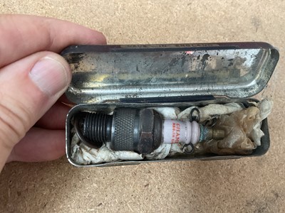 Lot 32 - Collection of vintage spark plugs to include Lodge and Champion, with original packaging and ephemera