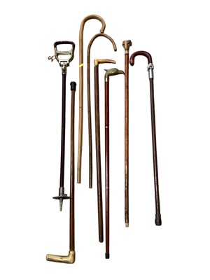 Lot 5181 - Collection of walk-in and shooting sticks to include a carved rams head, bone handles and others