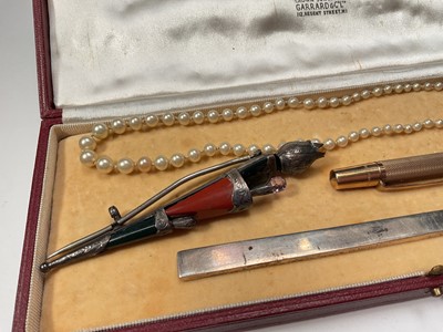 Lot 40 - Silver cigarette case containing some jewellery, silver two pronged fork, Scottish silver and hard stone brooch, gold plated pencil and other bijouterie