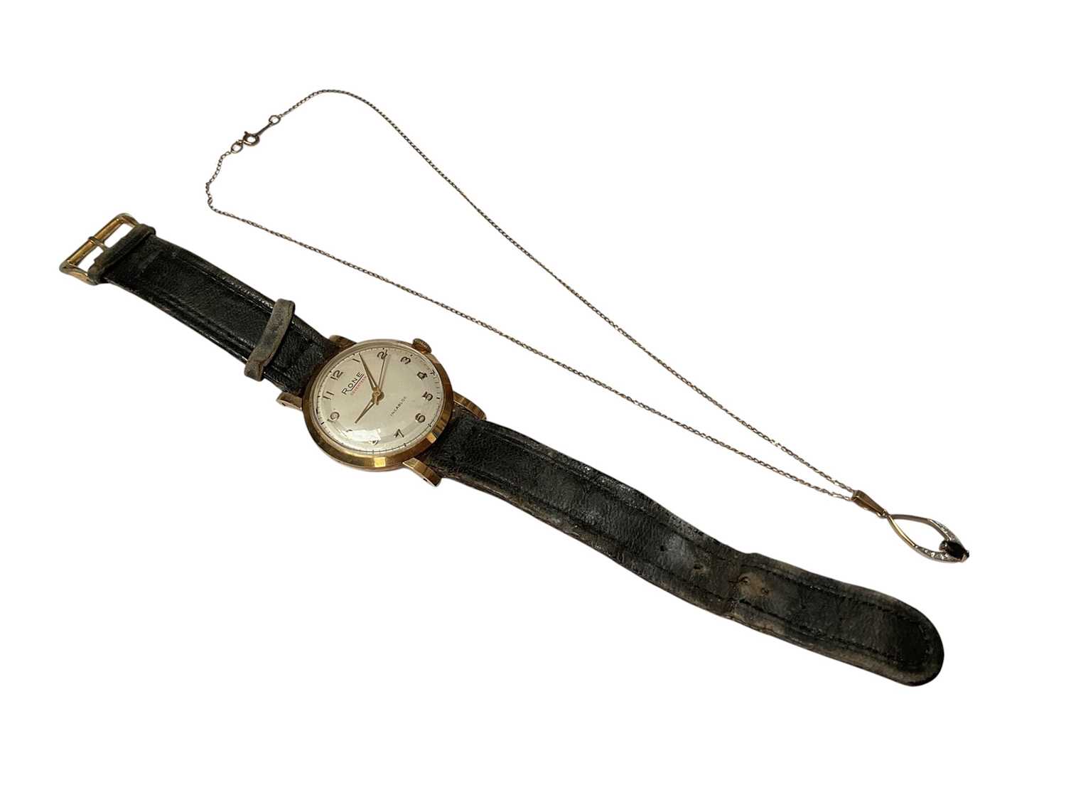 Lot 52 - 1960s 9ct gold cased Rona Seventeen wristwatch on leather strap and 9ct gold gem set pendant on 9ct gold chain