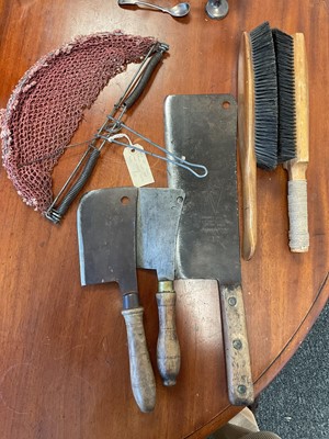 Lot 5246 - Sundry bygones, including an antique spring clap trap used to catch small birds, three meat cleavers, and two vintage brushes