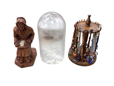 Lot 5260 - Collection of bobbins on a stand under a glass dome, including silver examples, together with a French carved wooden figure of a lacemaker