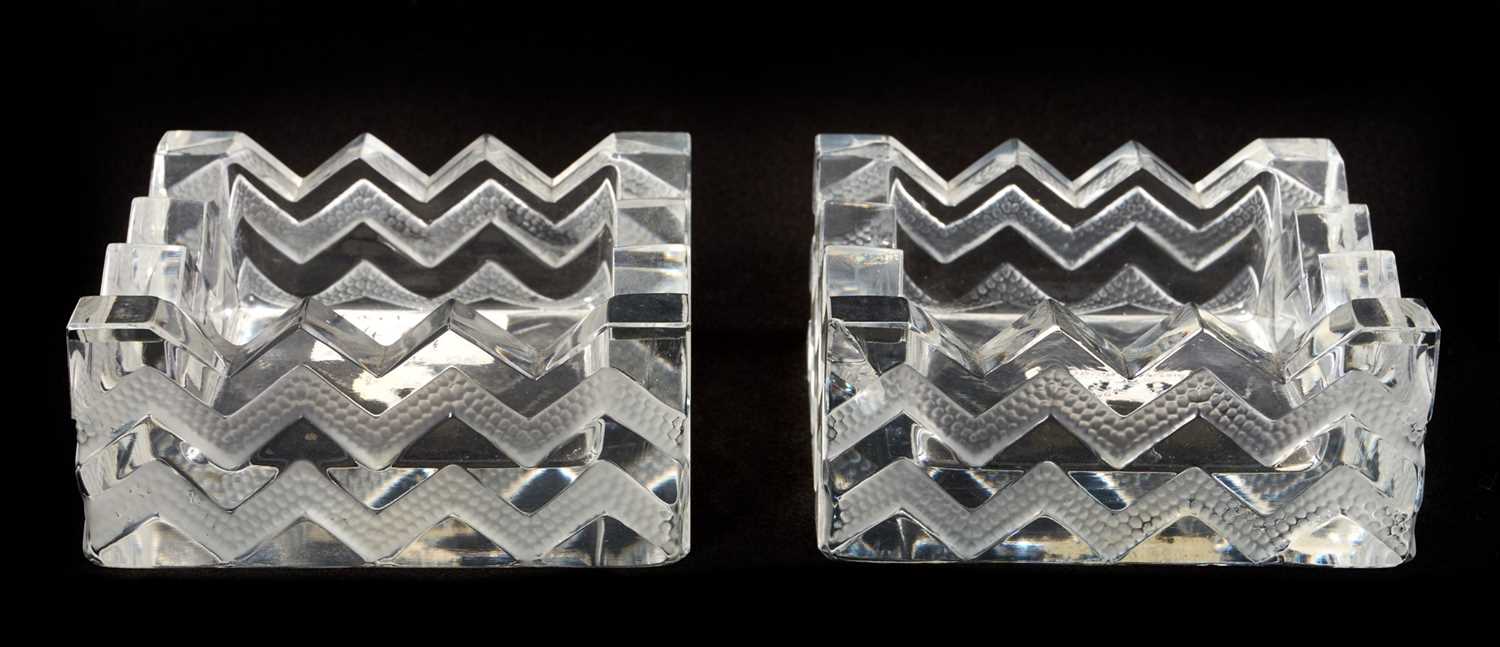 Lot 30 - Formerly the property of William Tallon R.V.M., pair Lalique Art Deco-style glass ashtrays marked 'Lalique France'. Sold by these rooms in The William Tallon Sale 5th July 2008, lot 479