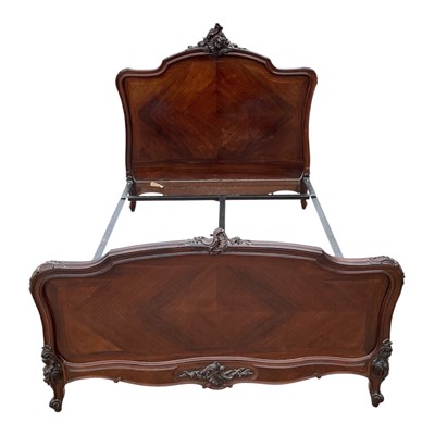 Lot 1366 - Early 20th century French walnut double bed with carved crestings