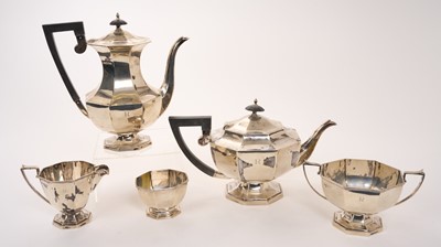 Lot George VI silver coffee pot of faceted octagonal form with angular ebonised handle and ebonised finial, the body engraved with the initial 'R'