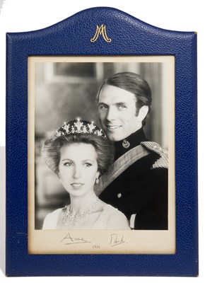 Lot Anne, Princess Royal and Captain Mark Phillips CVO signed Royal presentation photograph, 1975. A large and impressive portrait given by Princess Anne and her first husband to Commodore The Hon S...