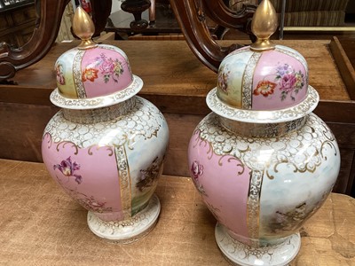Lot 5083 - Pair of 19th century German porcelain vases and covers with figural reserves on pink and gilt ground