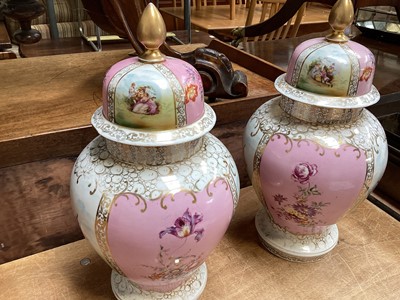 Lot 5083 - Pair of 19th century German porcelain vases and covers with figural reserves on pink and gilt ground