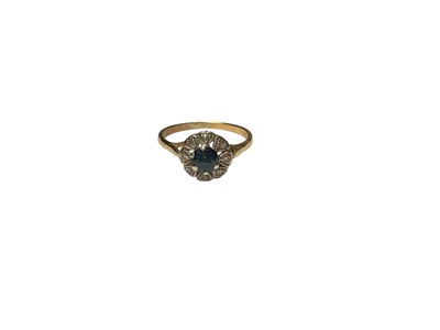 Lot 269 - Sapphire and diamond flower head cluster ring on 18ct gold setting