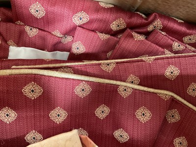 Lot 2578 - One pair of lined curtains with elephants, one pair of burgundy and gold lined curtains, one pair of lined coral curtains, one pair of lined and interlined peach curtains. (4)