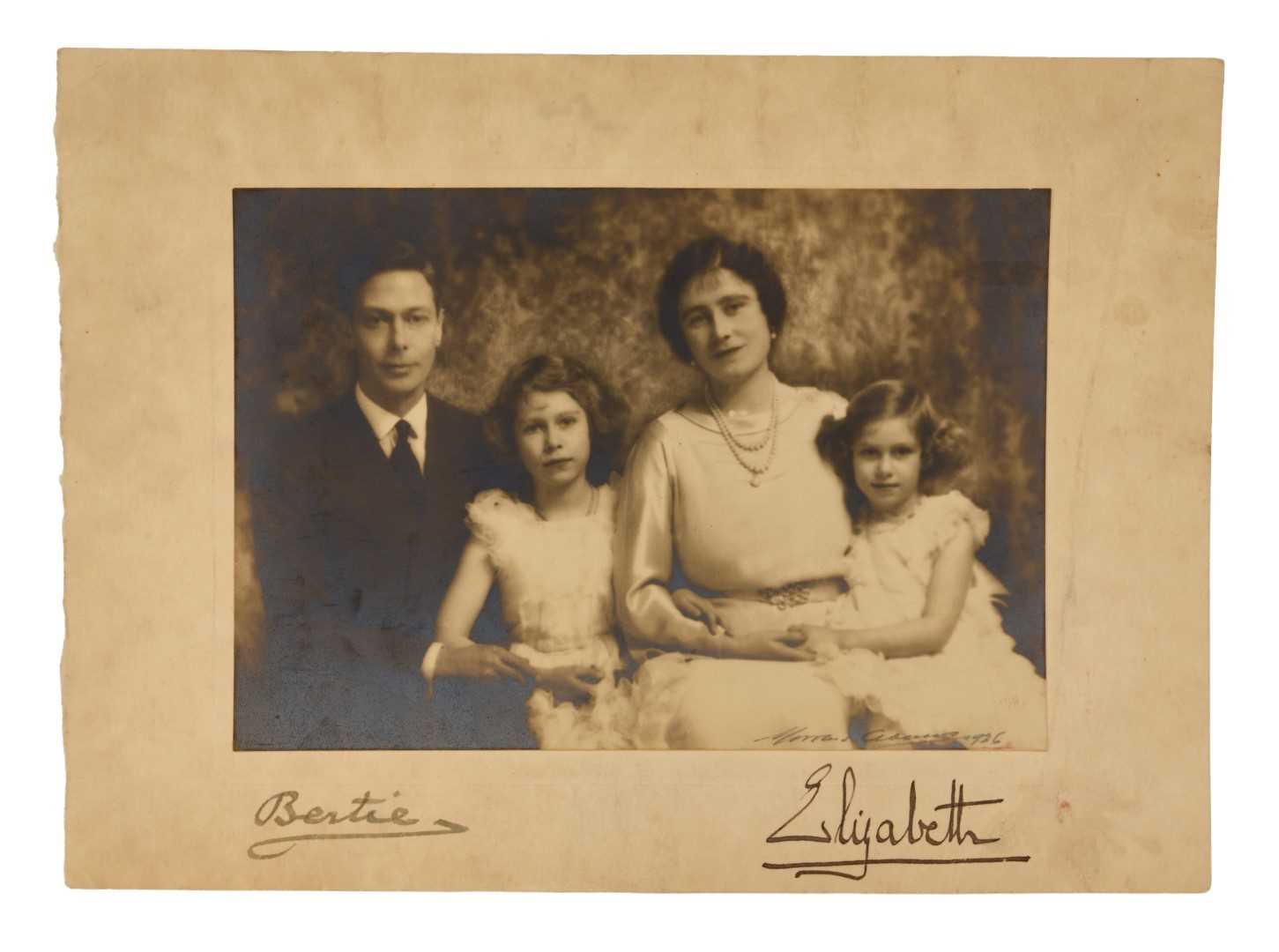 Lot 88 - T.M. King George VI and Queen Elizabeth scarce family signed presentation 1936 black and white portrait photograph of their Majesties with Princess Elizabeth and Margaret, signed in ink on mount...