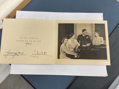 Lot 89 - T.M. King George VI and Queen Elizabeth, signed 1947 Christmas card with gilt crown to cover, black and white photograph of their Majesties Royal Gamily around a piano, signed 'George R.I 1947 El...