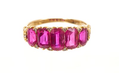Lot Victorian ruby five stone half hoop ring with five graduated rubies with rose cut diamond accents to the claws, in carved gold setting on tapered shank, ring size J½.