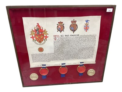 Lot 168 - Elizabeth II illuminated Grant of Arms on vellum for Peter Raymond Dallow, President of the Association of Accounting Technicians dated 1985 with seals in glazed frame 63 x 68cm overall