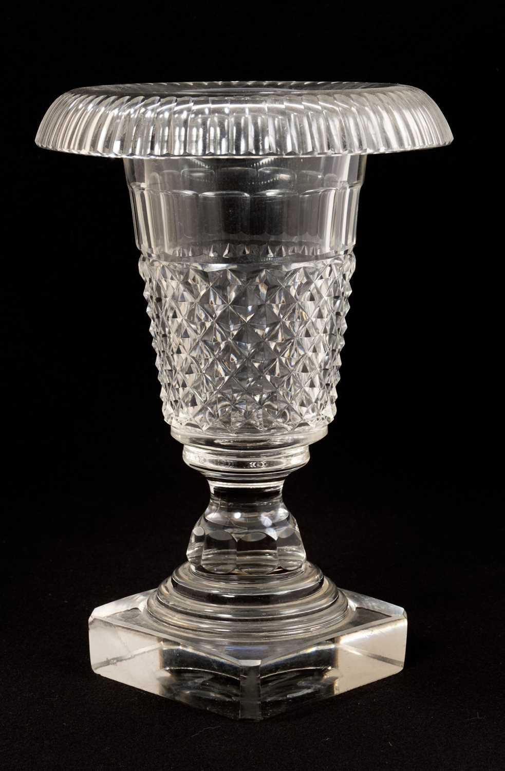 Lot 335 - 19th century cut glass urn with downturned rim, on canted square base, 25cm high