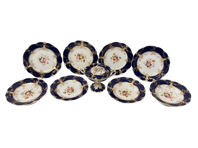 Lot 310 - 19th century Staffordshire dessert service, painted with flowers on a cobalt blue and gilt ground, consisting of four plates, four comports, and a tureen and cover