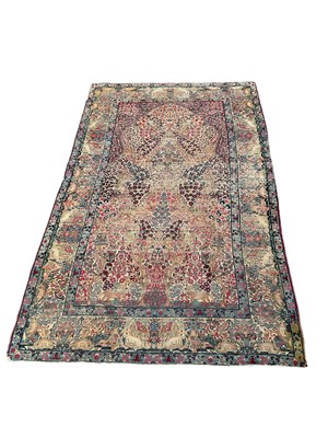 Lot Kasham tree of life rug, in meandering animal border, 238 x 150cm