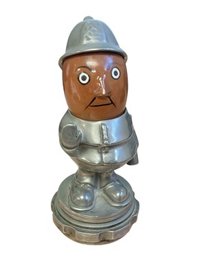 Lot 48 - Early 20th century 'Bobby' Policeman car mascot, with moving ceramic head, signed Hassall, mounted on a radiator cap, 14cm in overall height